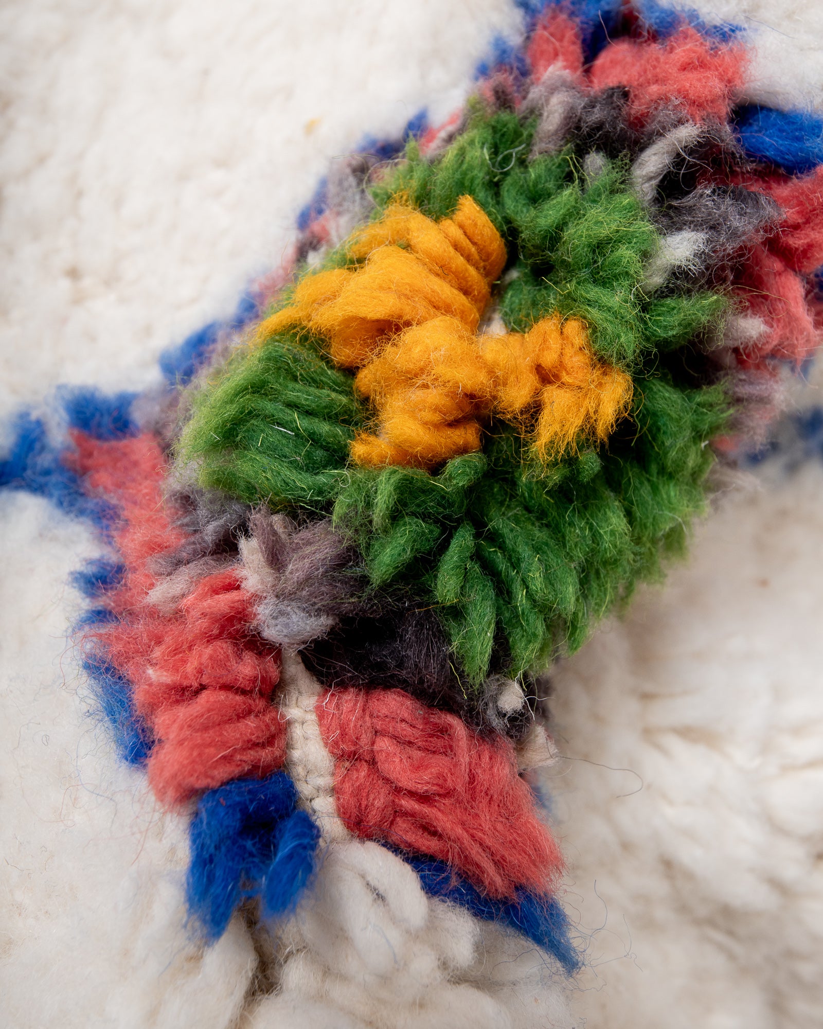 Modern, designer, handcrafted Berber rug from Morocco. Beniourain carpet with beautiful colours and patterns and fluffy wool texture.